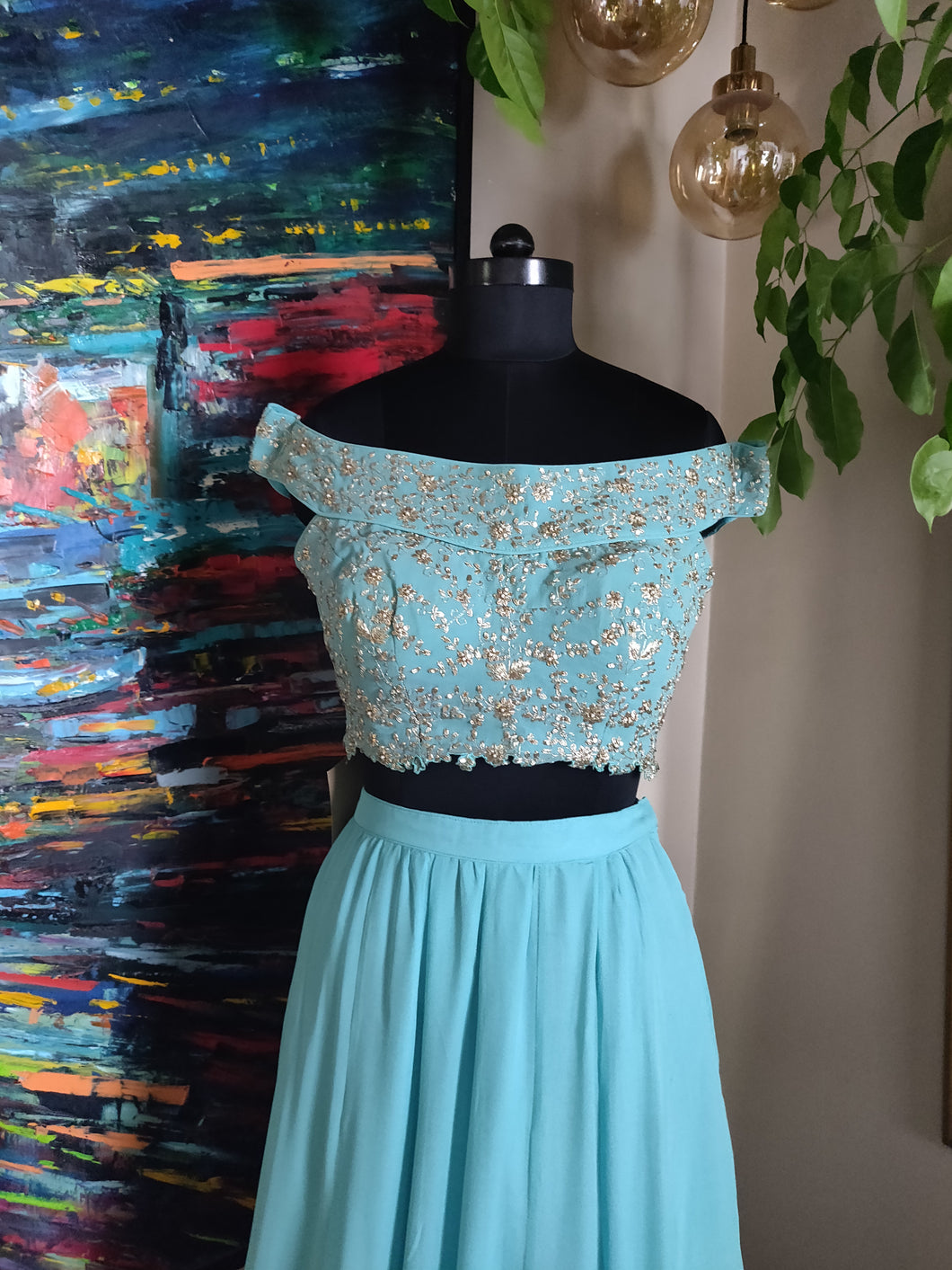 Turquoise off shoulder blouse